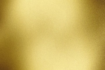 Brushed yellow metal wall, abstract texture background