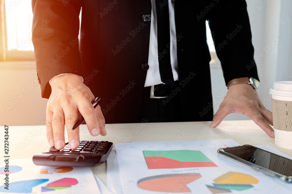 Poster businessmen are calculating with calculators to calculate costs and profits.
