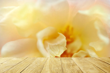 Fototapeta premium Empty top wooden table on soft blur petal rose flower for background