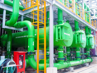 Auxiliary cooling pump systems for supply cooling water to mature equipment in power plant about industrial concept.