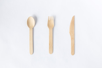 Eco friendly materials,Wooden disposable tableware isolated on a white background.