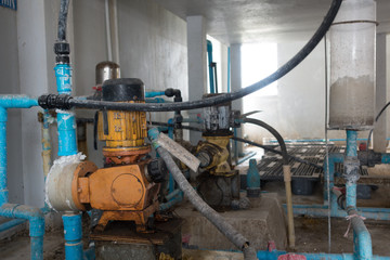 Old water pumping and water pipes in water treatment plant