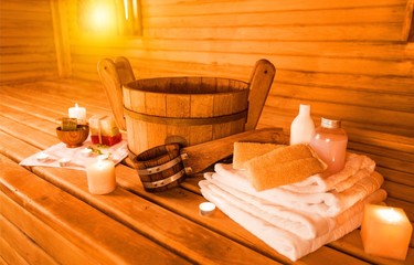 Fototapeta na wymiar Interior of sauna and sauna accessories on background