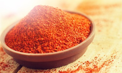 Aprika powder in wooden bowl