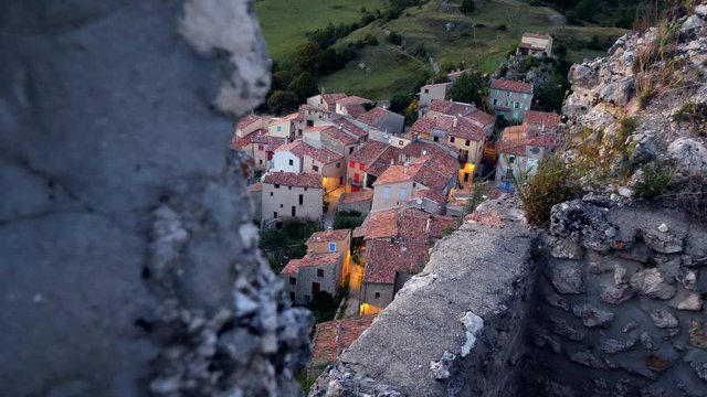 French mountain village Rougon behind a ruin on a rock