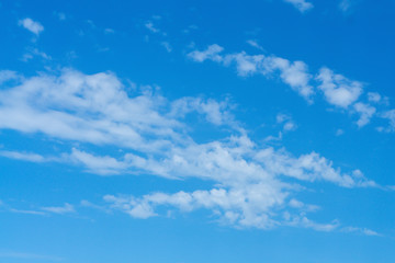 Beautiful cirrus clouds on bright blue sky