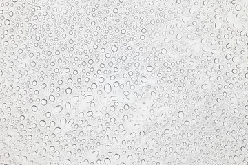 Water drops on glass, Rain droplets on glass background.