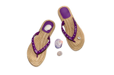 A pair of new, lilac women slippers for the beach