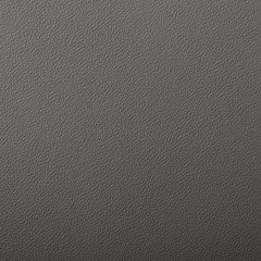 Closeup of dark color leather material texture background