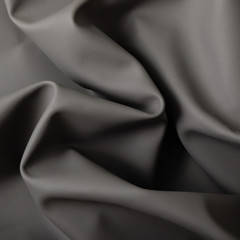 Fototapeta na wymiar Closeup of dark color leather material texture background