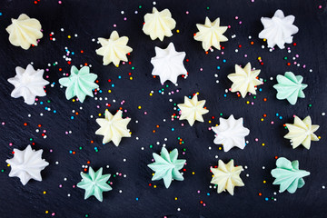 Fototapeta premium Meringue on a dark background.