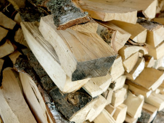 Woodpile with chopped firewood, closeup