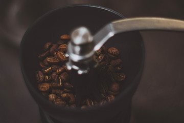 Coffee grinder with beans inside © Maciej