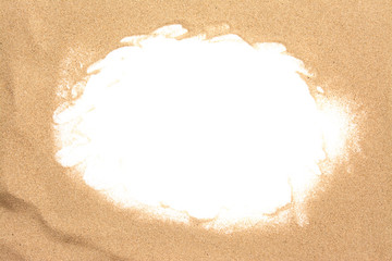 Closeup of sand of a beach or a desert on white. Summer background with copy space and frame for...
