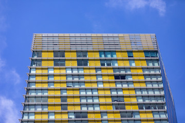 modern building with blue sky and clouds