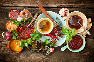 Assorted spicy marinades, sauces and rubs