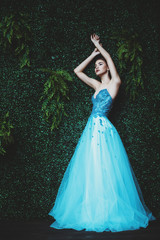 mysterious lady in a light blue dress