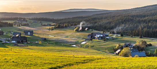Jizerka village at sunset time. View from Bukovec Mountain, Jizera Mountains, Czech Republic