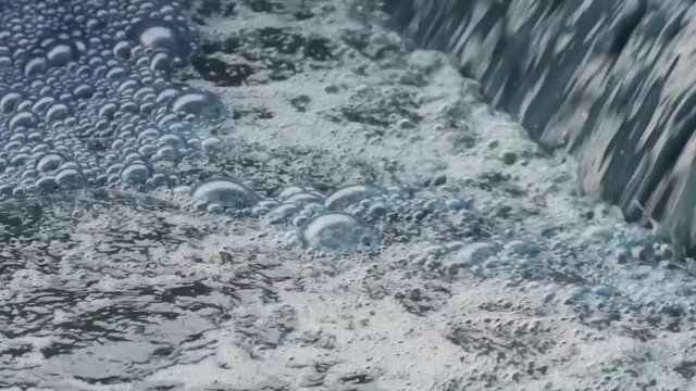 Indigo Blue Bubbles On The Surface During The Dyeing Of Denim.