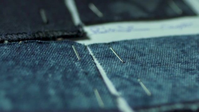 Closeup Of Samples Of Denim Textiles In A Manufacturing Factory Of Clothing.