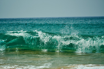 Ocean coast with big waves and rocks