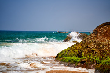 Fototapeta na wymiar Ocean coast with big waves and rocks