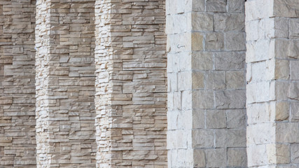 Decorative bricks on the wall of the house as a background