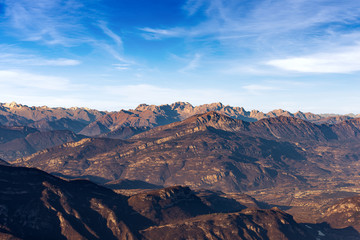 Naklejka na ściany i meble Italian Alps with the National Park of Adamello Brenta and the Adige Valley photographed on the Lessinia plateau, Veneto, Trentino, Italy, Europe