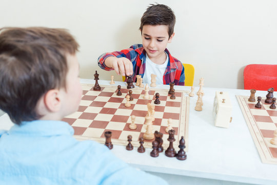 Kids Early Development. Pupil Kid Thinking about His Next Move in a Game of  Chess. Stock Image - Image of child, chess: 172839087