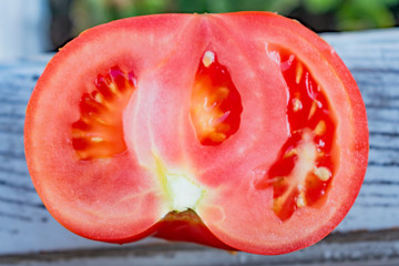 Fresh red tomato cut into halves
