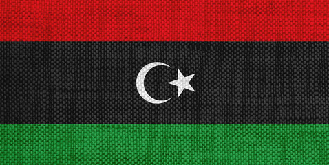 Fahne von Libyen auf altem Leinen