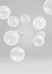 Fototapeta na wymiar Beautiful white balloons with soft gray background
