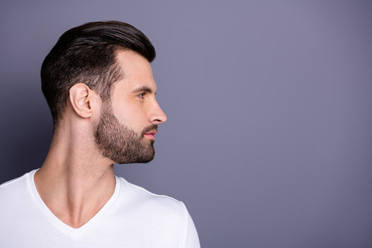 Profile side view photo of charming lovely attractive man look feel gorgeous concentrated focused isolated dressed white shirt t-shirt fashionable clothing grey background