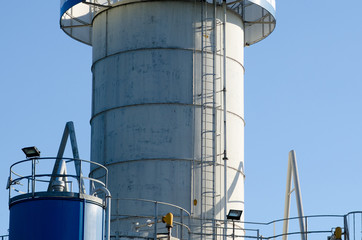 steel tower, with ramps and storage silos, in an industry that produces cement.