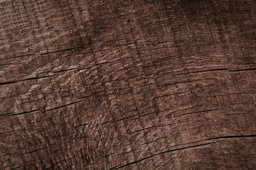Texture of dark brown old rough wood. Abstract background for design. Vintage retro