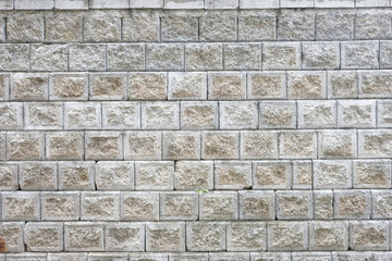 Weathered concrete blocks wall background