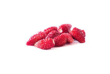 Fresh strawberries lay on white background. Background of wildberries. Ripe wild strawberry on a white background. Wild strawberries with copy space for text. Top view.