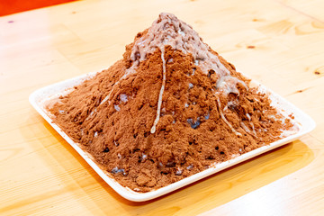 ice shave with chocolate powder and sweetened condensed milk
