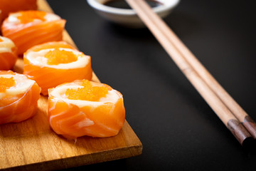 fresh salmon sushi roll with mayonnaise and shrimp egg © topntp