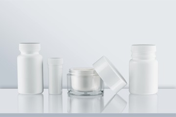 Cosmetic containers isolated on background