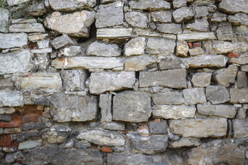 Texture of a stone wall. Old stone wall texture background.