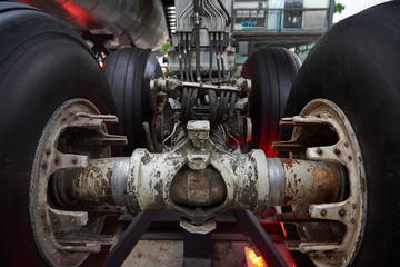 old rusty wheel system of plane