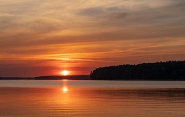 Beautiful evening lake at sunset