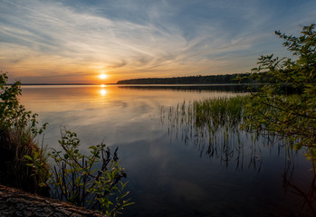 Fototapeta na wymiar Beautiful evening lake at sunset