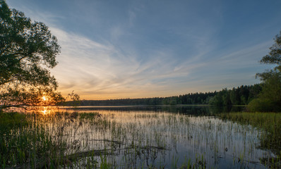 Beautiful evening lake at sunset