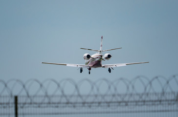 The plane flies through the sky