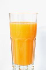 Orange juice glass, isolated on white background, vertical format