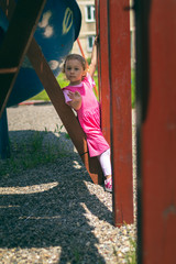 Little girl at playground during sunny day