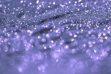 glossy brassy sand made of glitters - club concept with bokeh texture - fantastic abstract photo background