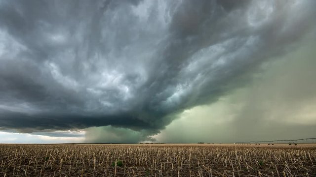 Time lapse of tornado warned supercell storm rolling through the Nebraska plains as it moves over the landscape as it changes shape.